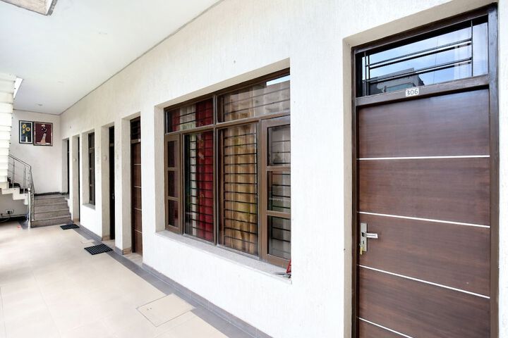 OYO 4548 HOTEL TOM STAY
