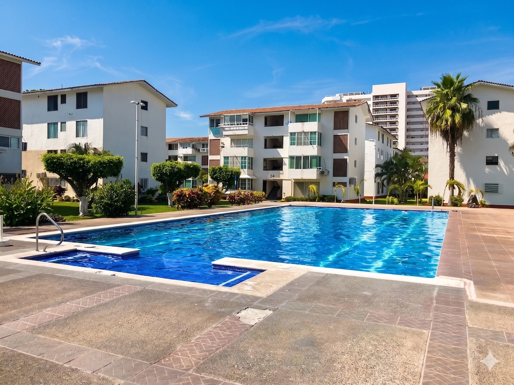 Exterior of La Marina Condominios by Monyxbnb