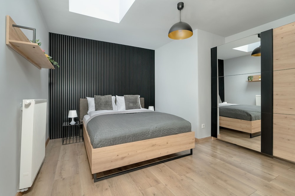 Loft Antresola & balkon Pozna by Renters